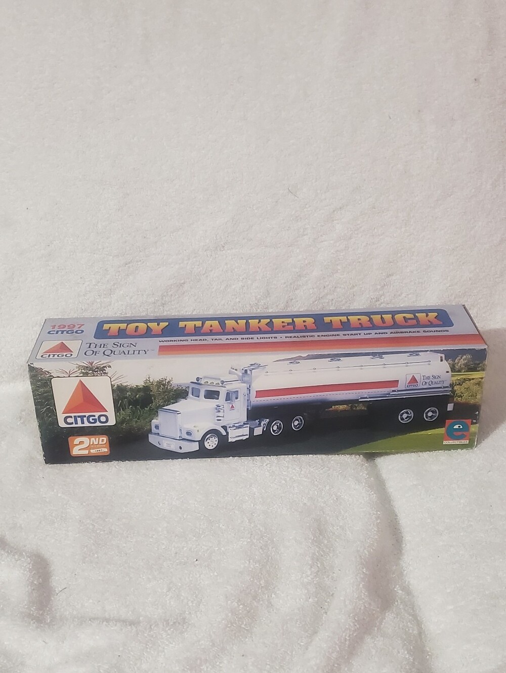 Source Unknown White and Red Toy Tanker Truck Model